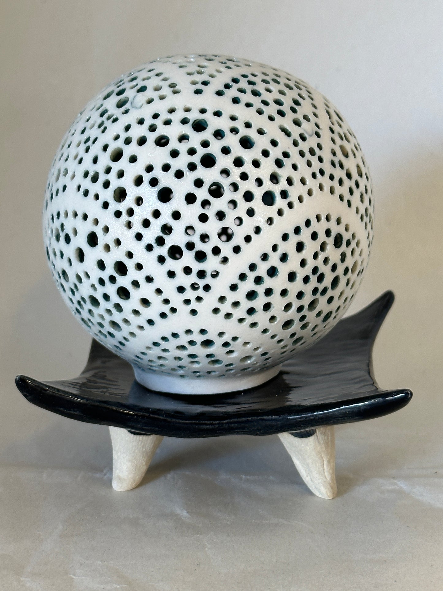 Lighted porcelain orb