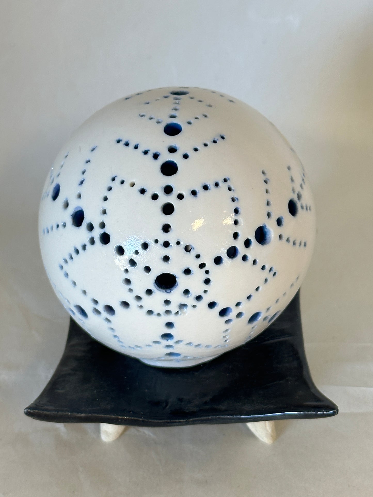 Carved porcelain orb