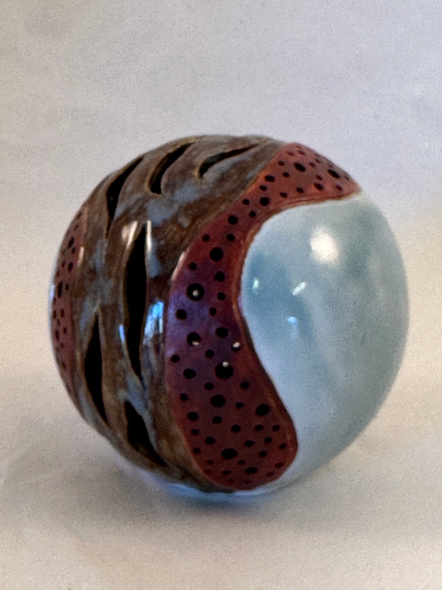 Carved porcelain orb