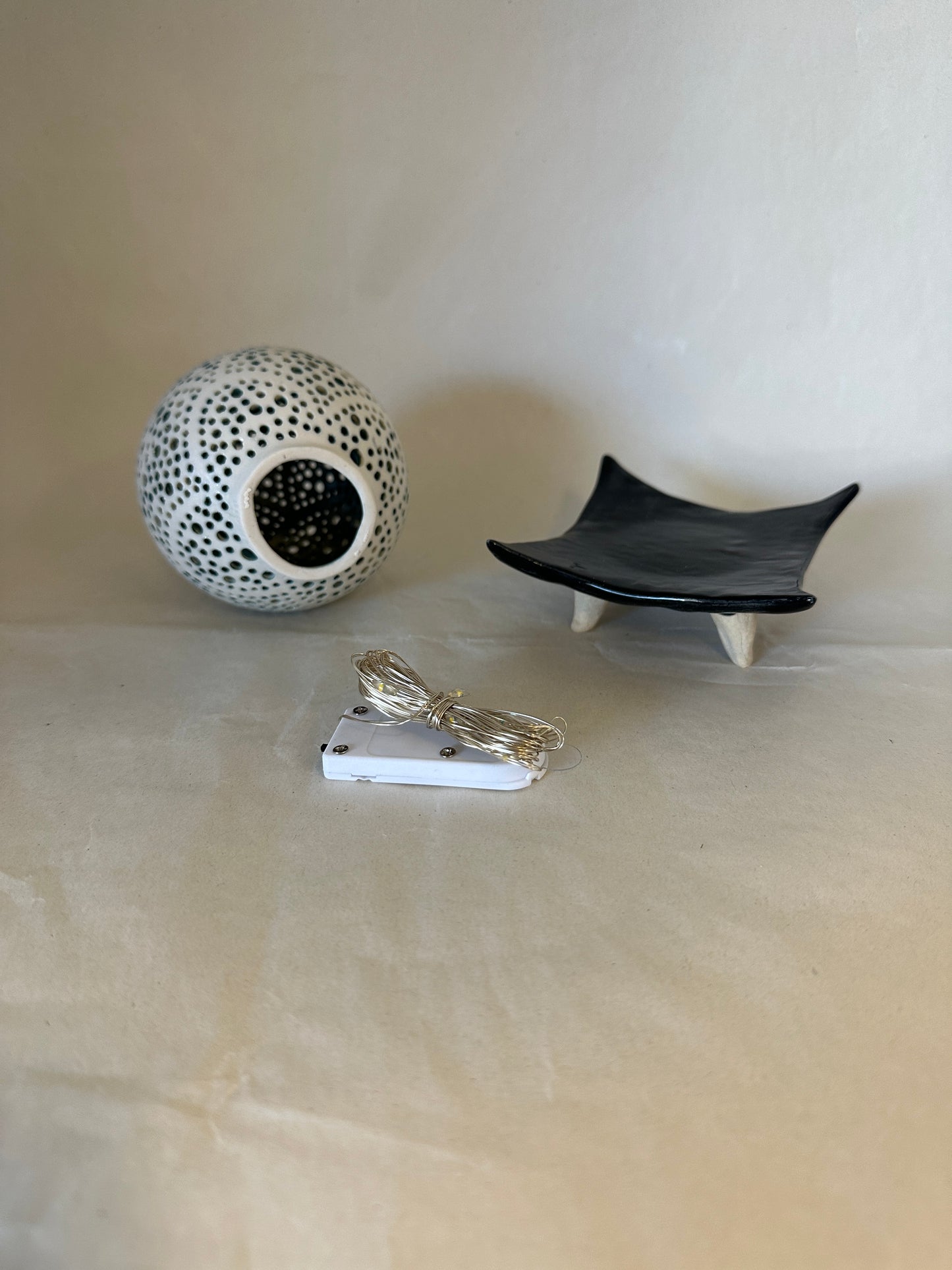 Lighted porcelain orb
