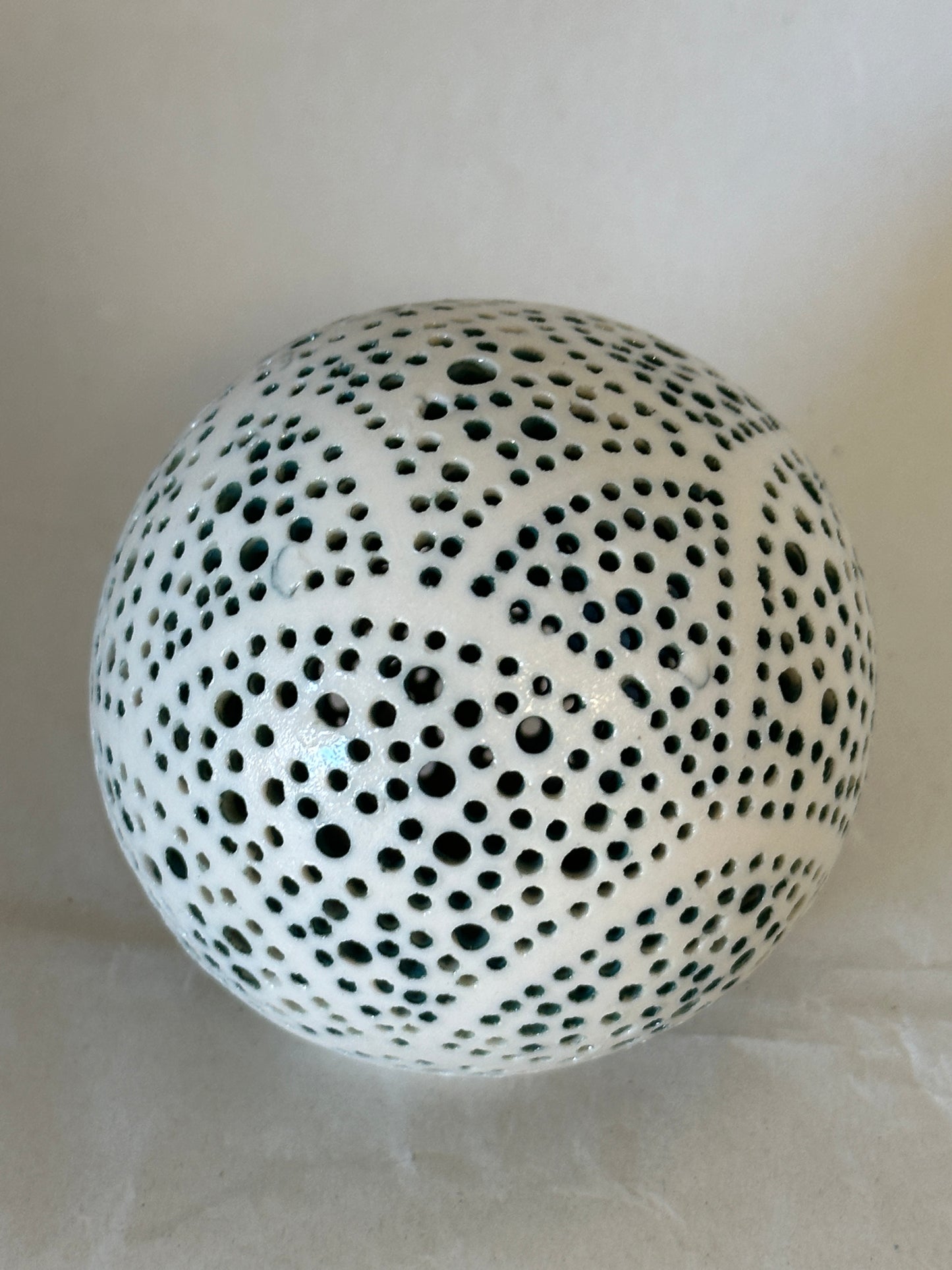 Lighted porcelain orb