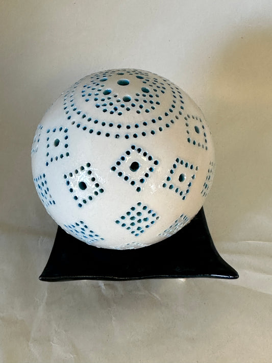 Carved porcelain orb