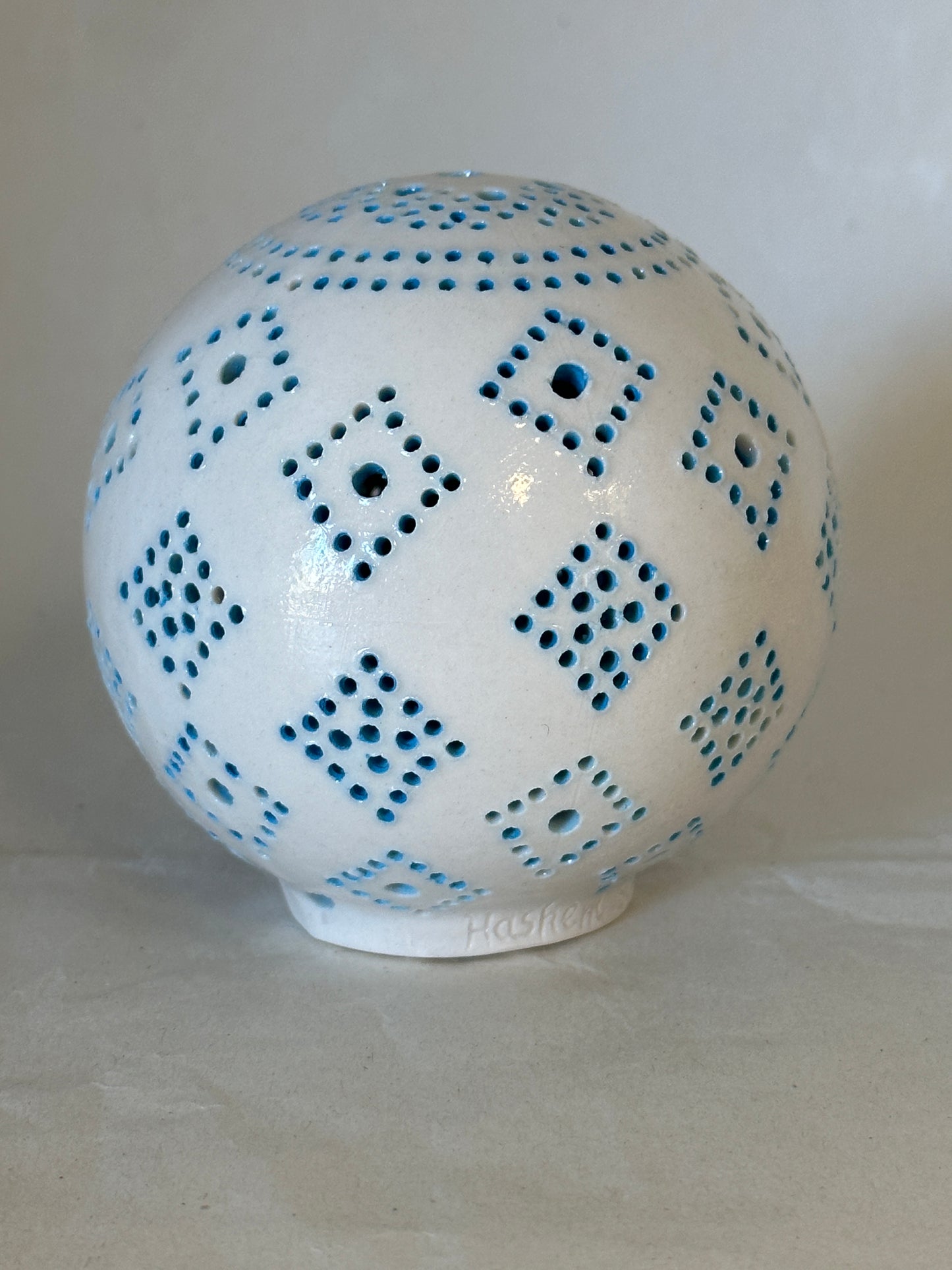 Carved porcelain orb