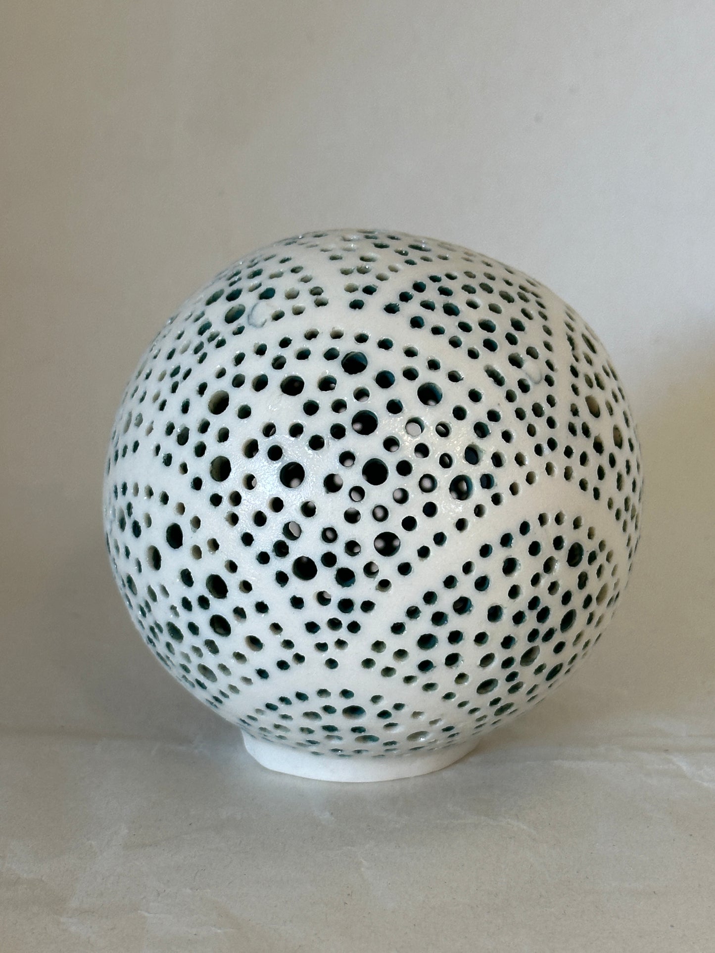 Lighted porcelain orb